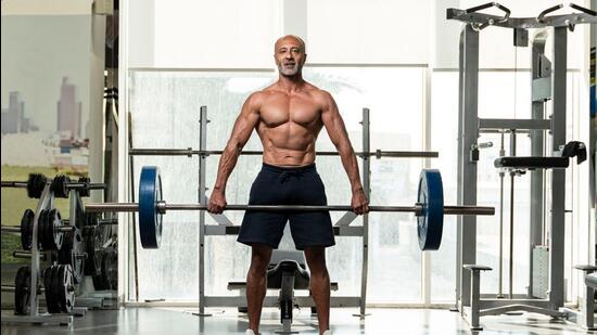 Follow weight training programs which will help in increasing muscle size (Shutterstock) Follow weight training programs which will help in increasing muscle size (Shutterstock)