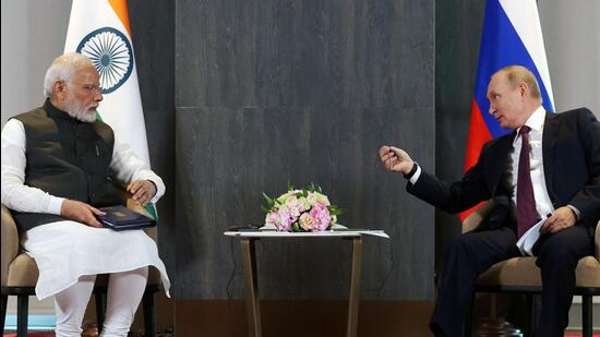 Russian President Vladimir Putin and Indian Prime Minister Narendra Modi attend a meeting on the sidelines of the Shanghai Cooperation Organization (SCO) summit in Samarkand, Uzbekistan (Reuters)