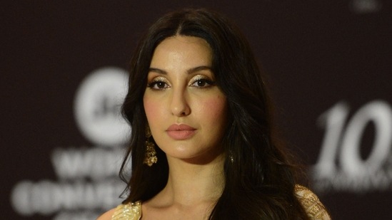 Bollywood film actor Nora Fatehi at a fashion show for Mijwan Welfare Society in Mumbai.&nbsp;(AFP)