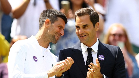 Novak Djokovic with Roger Federer(REUTERS)