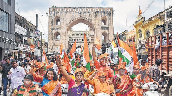 Hyderabad: BJP Mahila Morcha activists participate in a bike rally organised as part of the upcoming 'Hyderabad Liberation Day' celebrations, near Charminar in Hyderabad, Thursday, Sept. 15, 2022. The erstwhile Hyderabad state of Nizam was merged with the Indian Union on September 17, 1948. (PTI Photo)(PTI09_15_2022_000043A) (PTI)