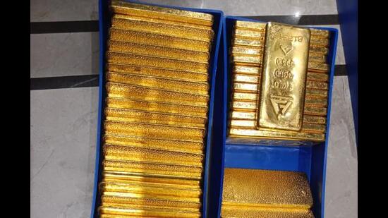 Nine gold biscuits weighing 1,050 grams valuing ₹54,70,500 were found concealed in packets. (HT File Pic)