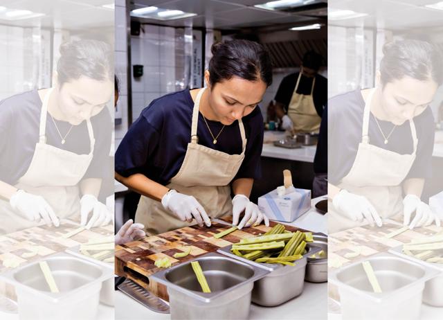 Sonal scraping off steamed drumstick flesh for one of the courses