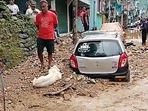 In this file image from September 10, people can be seen gathering near a vehicle that is buried under the debris on the street.(ANI) In this file image from September 10, people can be seen gathering near a vehicle that is buried under the debris on the street.(ANI)
