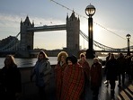 People line up near Tower Bridge to pay their respects to the late Queen Elizabeth II during the Lying-in State, in Westminster Hall, in London, England.(AP) People line up near Tower Bridge to pay their respects to the late Queen Elizabeth II during the Lying-in State, in Westminster Hall, in London, England.(AP)