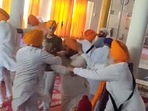 As the scuffle intensified, turbans of some of the men came off. As the scuffle intensified, turbans of some of the men came off.