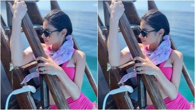 Mouni shared a slew of pictures of herself decked up in the bikini and loving the sun on her face. (Instagram/@imouniroy)