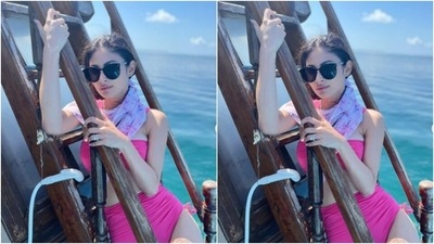 Mouni decked up in minimal makeup – drawn eyebrows, contoured cheeks and a shade of pastel pink lipstick, as she soaked in the Maldives sun. (Instagram/@imouniroy)