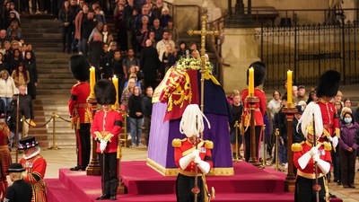 The coffin of Queen Elizabeth II lies in state on the catafalque in Westminster Hall, at the Palace of Westminster, London. (AP) The coffin of Queen Elizabeth II lies in state on the catafalque in Westminster Hall, at the Palace of Westminster, London. (AP)