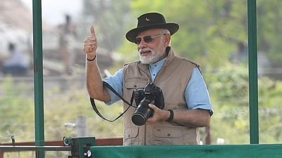 PM Modi is seen clicking photographs as the historic moment was registered. ((Twitter) ) PM Modi is seen clicking photographs as the historic moment was registered. ((Twitter) )