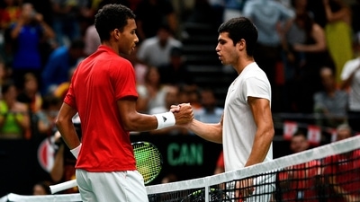Canada's Felix Auger Aliassime and Spain's Carlos Alcaraz shake hands after their match (REUTERS)
