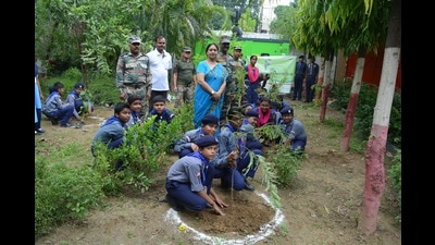 Scouts busy planting trees in Prayagraj. (HT PHOTO) Scouts busy planting trees in Prayagraj. (HT PHOTO)