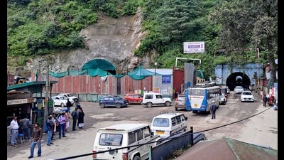 Vehicles plying through the 175-year-old Dhalli Tunnel and (left) the new tunnel under construction at Sanjauli in Shimla town on Saturday. (Deepak Sansta/HT) Vehicles plying through the 175-year-old Dhalli Tunnel and (left) the new tunnel under construction at Sanjauli in Shimla town on Saturday. (Deepak Sansta/HT)