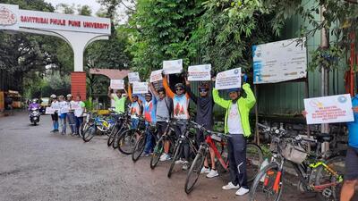 The protest was held by the city-based Indo Athletic Society, who reached out to vice-chancellor KV Kale and urged him to reconsider the decision. (HT PHOTO)