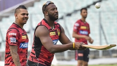 File photo of cricketers Andre Russell and Sunil Narine (in front). (PTI) File photo of cricketers Andre Russell and Sunil Narine (in front). (PTI)
