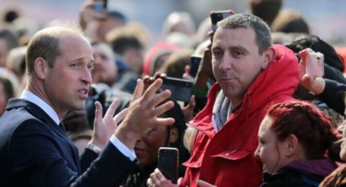Prince William shook hands and chatted with people at Lambeth Bridge (AFP)