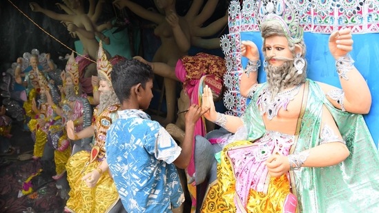 Vishwakarma Jayanti, also known as Bhadra Sankranti, holds great religious significance among Hindus. According to the Hindu Scriptures, Lord Vishwakarma is the son of Lord Brahma. Lord Vishwakarma created the Dwarka Nagri and he also helped Lord Brahma in the making of the universe. This year, Vishwakarma Puja is being observed today, September 17.(HT Photo/Santosh Kumar)