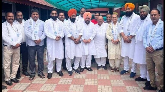 Ludhiana West MLA Gurpreet Gogi (centre) along with leaders who joined Aam Aadmi Party in Chandigarh. (HT Photo)