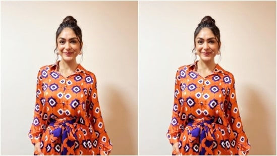 Mrunal, styled by fashion stylist Poorvaa Jain, wore her tresses into a top knot as she posed for the pictures.(Instagram/@mrunalthakur)