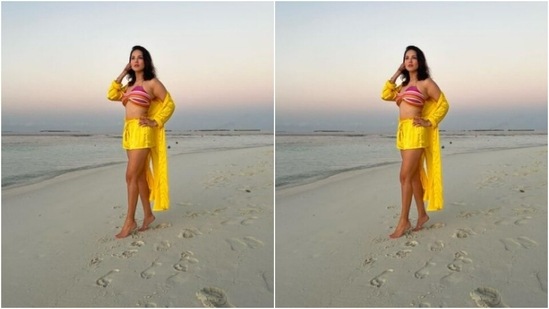 Sunny played muse to fashion designer house Flirtatious and picked a bright yellow co-ord set to match the beach vibes.(Instagram/@sunnyleone)