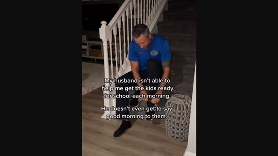 The image, taken from the Instagram video, shows the dad getting ready for his work before his kids wake up. (Instagram/@_perfectlyimperfectfamily_)