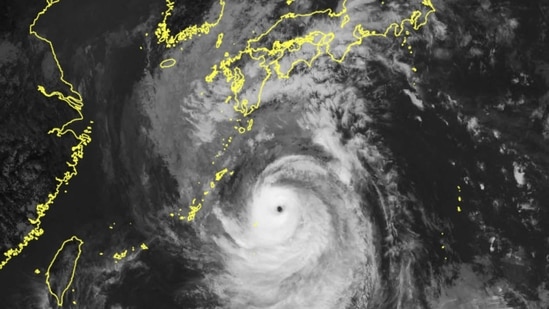 This handout photo taken and released on September 17, 2022 by the Japan Meteorological Agency shows satellite imagery shows Typhoon Nanmadol located near the southern remote islands of Japan.(AFP) This handout photo taken and released on September 17, 2022 by the Japan Meteorological Agency shows satellite imagery shows Typhoon Nanmadol located near the southern remote islands of Japan.(AFP)