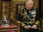 Queen Elizabeth II's Funeral: Prince Charles reads the Queen's speech next to her crown.