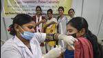 Patna: A healthcare worker administers a dose of Covid-19 preventive vaccine to a student, at a vaccination camp in Patna Women’s College, Monday, Aug. 1, 2022. (PTI Photo) (PTI08_01_2022_000129B) (PTI) Patna: A healthcare worker administers a dose of Covid-19 preventive vaccine to a student, at a vaccination camp in Patna Women’s College, Monday, Aug. 1, 2022. (PTI Photo) (PTI08_01_2022_000129B) (PTI)