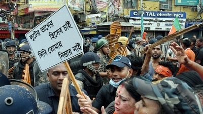 Bharatiya Janata Party leaders and party supporters in clash with police personnel during party's' Nabanna Chalo' march against the state government, in Kolkata on Tuesday. (ANI Photo) Bharatiya Janata Party leaders and party supporters in clash with police personnel during party's' Nabanna Chalo' march against the state government, in Kolkata on Tuesday. (ANI Photo)