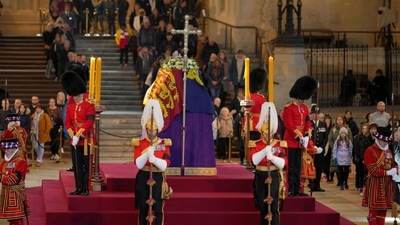 Queen Elizabeth II's Funeral: Members of the public file past the coffin of Queen Elizabeth II. (Reuters)