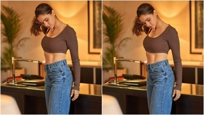 Aamna picked a maroon cropped to featuring full sleeves, and teamed it with a pair of high-waisted blue distressed denims with wide legs. (Instagram/@aamnasharifofficial)