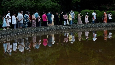 Covid In China: Residents of a compound line up for Covid testing amid citywide mass testing in Chengdu, China. (Reuters)