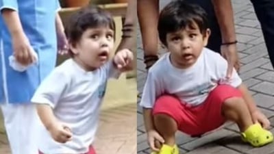 Saif Ali Khan and Kareena Kapoor's son Jehangir Ali Khan got curious about the paparazzi. Saif Ali Khan and Kareena Kapoor's son Jehangir Ali Khan got curious about the paparazzi.