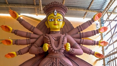 This year's theme is titled ‘Phire Dekho Kolkata’ and it will capture the unforgettable images of Kolkata Durga Puja celebrations over the years. (Pic for representation) (PTI) This year's theme is titled ‘Phire Dekho Kolkata’ and it will capture the unforgettable images of Kolkata Durga Puja celebrations over the years. (Pic for representation) (PTI)