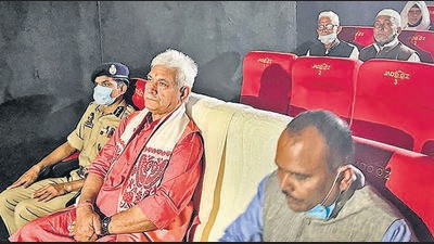 **EDS: TWITTER IMAGE POSTED BY @OfficeOfLGJandK ON SUNDAY, SEPT. 18, 2022; TO GO WITH STORY DES 23** Srinagar:Jammu and Kashmir Lieutenant Governor Manoj Sinha during inauguration of multipurpose cinema halls at Pulwama and Shopian. (PTI Photo)(PTI09_18_2022_000140B) (PTI) **EDS: TWITTER IMAGE POSTED BY @OfficeOfLGJandK ON SUNDAY, SEPT. 18, 2022; TO GO WITH STORY DES 23** Srinagar:Jammu and Kashmir Lieutenant Governor Manoj Sinha during inauguration of multipurpose cinema halls at Pulwama and Shopian. (PTI Photo)(PTI09_18_2022_000140B) (PTI)