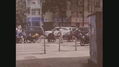 The image, taken from the video instagrammed by Mumbai Police, shows a cop helping specially-abled men at a traffic point. (Instagram/@mumbaipolice) The image, taken from the video instagrammed by Mumbai Police, shows a cop helping specially-abled men at a traffic point. (Instagram/@mumbaipolice)