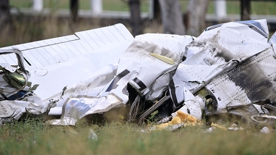 A crashed plane, one of two, lies along Niwot Road between Highway 287 and N. 95th St in Longmont, Colorado. (AP)
