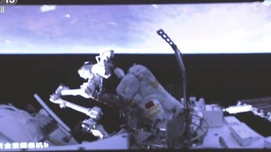 Chinese astronauts Cai Xuzhe and Chen Dong installed a foot-stop to fix an astronaut’s feet to a robotic arm.
