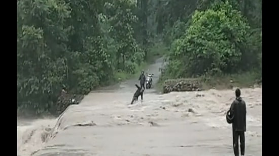 The video which was also tweeted by news agency ANI showed the young man being swept away by the river in the Fatehpur area of Uttarakhand.(ANI videograb) The video which was also tweeted by news agency ANI showed the young man being swept away by the river in the Fatehpur area of Uttarakhand.(ANI videograb)