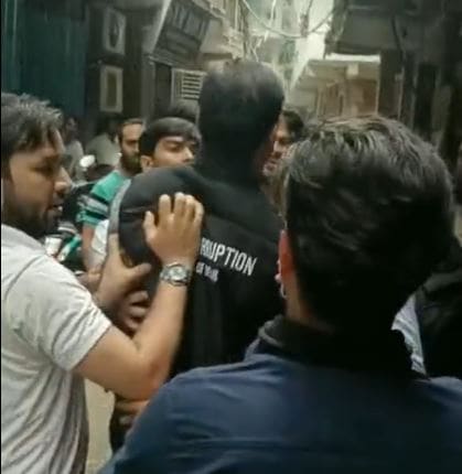 Video grab of the incident at Jamia Nagar. (ANI Twitter)
