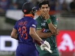 Pakistan's Naseem Shah, right, reacts after bowling a delivery to India's Virat Kohli Pakistan's Naseem Shah, right, reacts after bowling a delivery to India's Virat Kohli