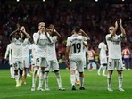 Real Madrid's Federico Valverde with teammates applaud fans after the match&nbsp;