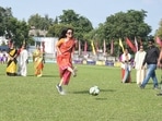 The image shows Trinamool Congress MP Mahua Moitra playing football in a saree.&nbsp;