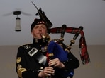 A piper plays during the funeral of Britain's Queen Elizabeth II, in London, Monday.(AP) A piper plays during the funeral of Britain's Queen Elizabeth II, in London, Monday.(AP)