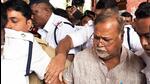 Former West Bengal minister Partha Chatterjee being produced at the Alipore Court by the CBI in connection with the alleged teacher’s recruitment scam. (ANI Photo) Former West Bengal minister Partha Chatterjee being produced at the Alipore Court by the CBI in connection with the alleged teacher’s recruitment scam. (ANI Photo)
