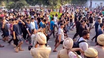 Students stage a protest at Chandigarh University. (PTI) Students stage a protest at Chandigarh University. (PTI)