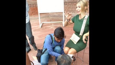 The Spanish woman tourist bitten by a monkey at the Taj Mahal being provided first aid on Monday. (HT Photo) The Spanish woman tourist bitten by a monkey at the Taj Mahal being provided first aid on Monday. (HT Photo)