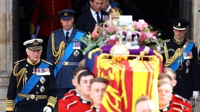 Queen Elizabeth II's Funeral: Britain's King Charles, William, Prince of Wales, and Prince Edward walk as the coffin of Britain's Queen Elizabeth is carried out of Westminster Abbey. (Reuters)