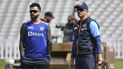 India's Virat Kohli with head coach Rahul Dravid (AP) India's Virat Kohli with head coach Rahul Dravid (AP)