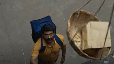 Kapil Sharma as a delivery boy in a still from Zwigato trailer. Kapil Sharma as a delivery boy in a still from Zwigato trailer.